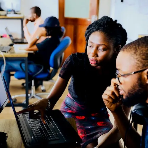 Engineer providing code review; photo by Desola Lanre-Ologun 