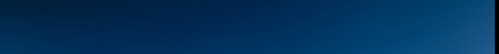 Banner of blue color block, slightly gradiated from dark blue on the left to medium-blue on the right